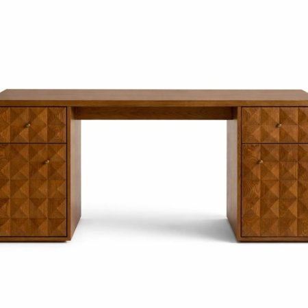 Elto desk in natural wood with geometric carved drawers on white background