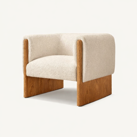 KORA lounge chair with solid wood frame and upholstered bouclé seat in modern minimalist design