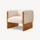 KORA lounge chair with solid wood frame and upholstered bouclé seat in modern minimalist design