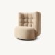 Sofen lounge chair with quilted upholstered backrest and soft sculptural design in a modern interior style