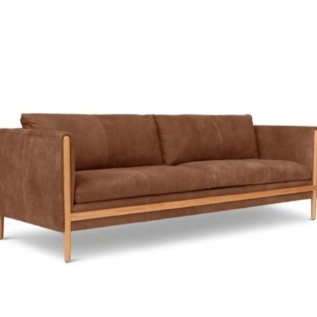Darkroom sofa with solid wood frame and deep upholstered seating in a modern contemporary interior style