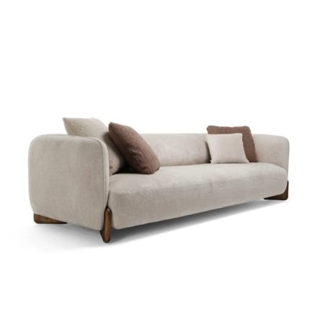 Niva sofa with soft upholstered design, curved silhouette, and relaxed seating in a modern interior style