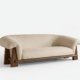 Mavro sofa with curved upholstered design and solid wood frame in a modern organic interior style